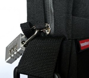 When the bag is zipped closed, a small travel-size padlock can be placed through the zipper and left side accessory loop to deter theft of items inside of bag.